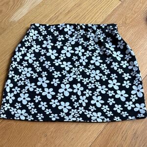 Black skirt with white flowers, size M